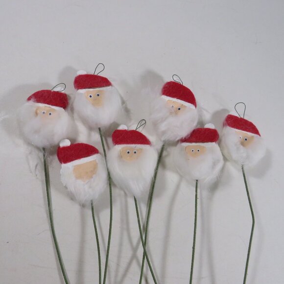 Santa Heads made of Wood on green floral covered wire CRAFT PROJECT - Picture 1 of 8
